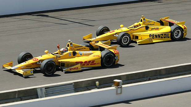 140525221232-hunter-rheay-beats-helio-castroneves-98th-indy-500-single-image-cut.jpg